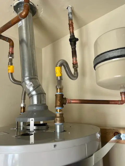 Water heater installation and plumbing repair in Dexter